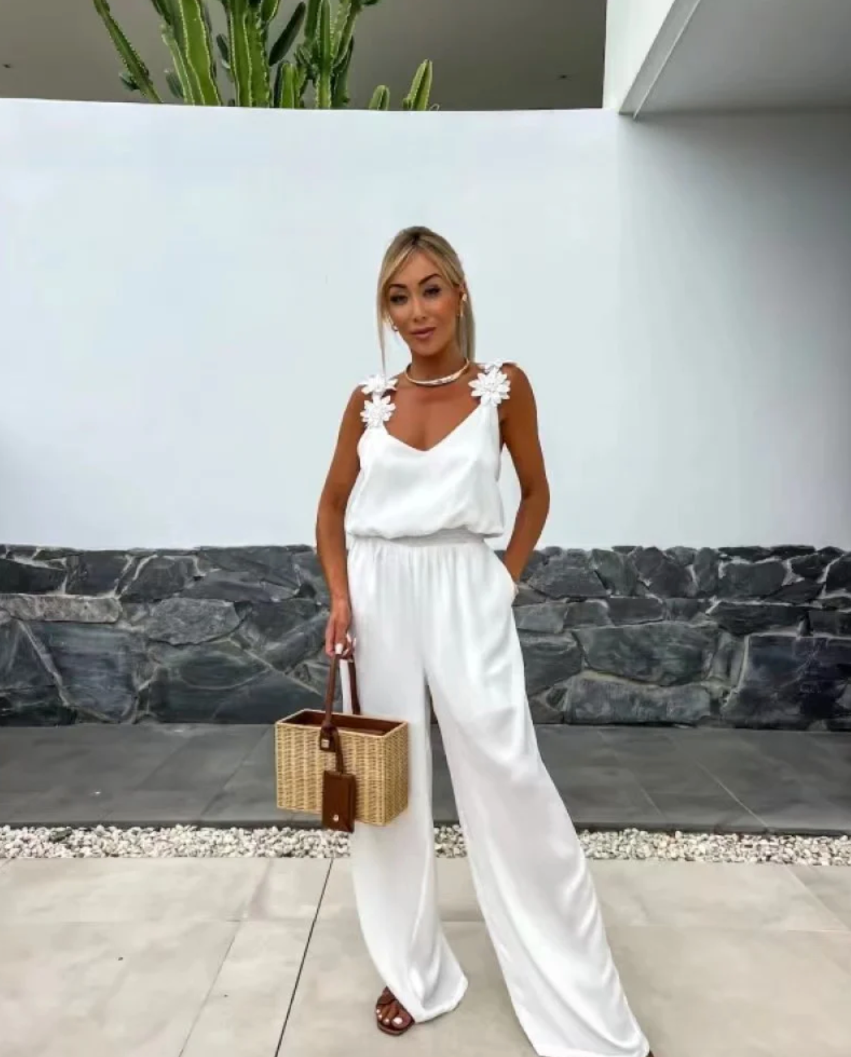 NOMI™ - Ärmlös jumpsuit med breda ben